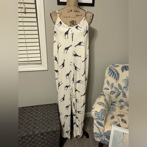 Elegant White Jumpsuit with Black Animal Print